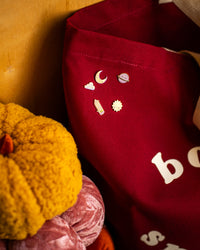 Tiny planet enamel pin