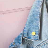 Tiny sun enamel pin